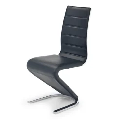 Sedia da pranzo moderna in ecopelle nero bianco gamba in acciaio Elina