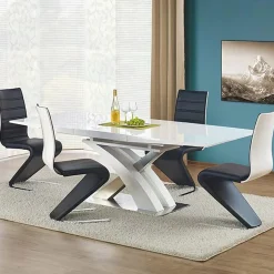 Sedia da pranzo moderna in ecopelle nero bianco gamba in acciaio Elina